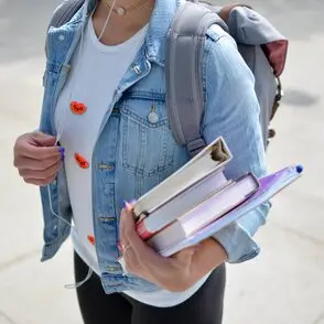 sdg8 student with books