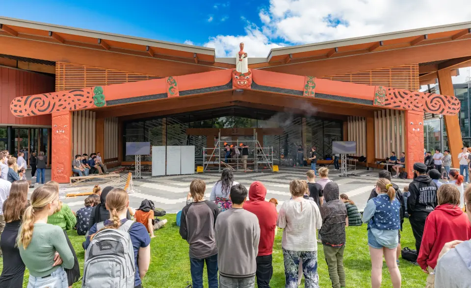 students-standing-outside-pa-marae