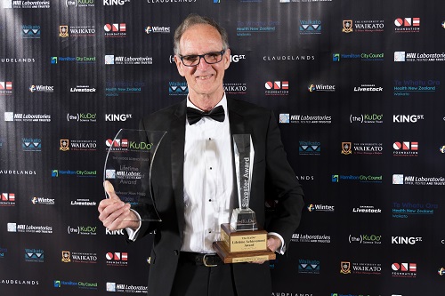 Alan Hogg holding his award. 