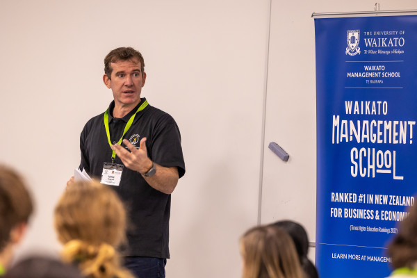 Jamie talking to a crowd.