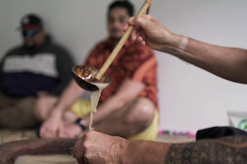 kava drink hand spoon people