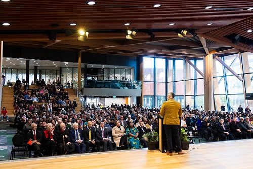 Speech being given inside the Pa