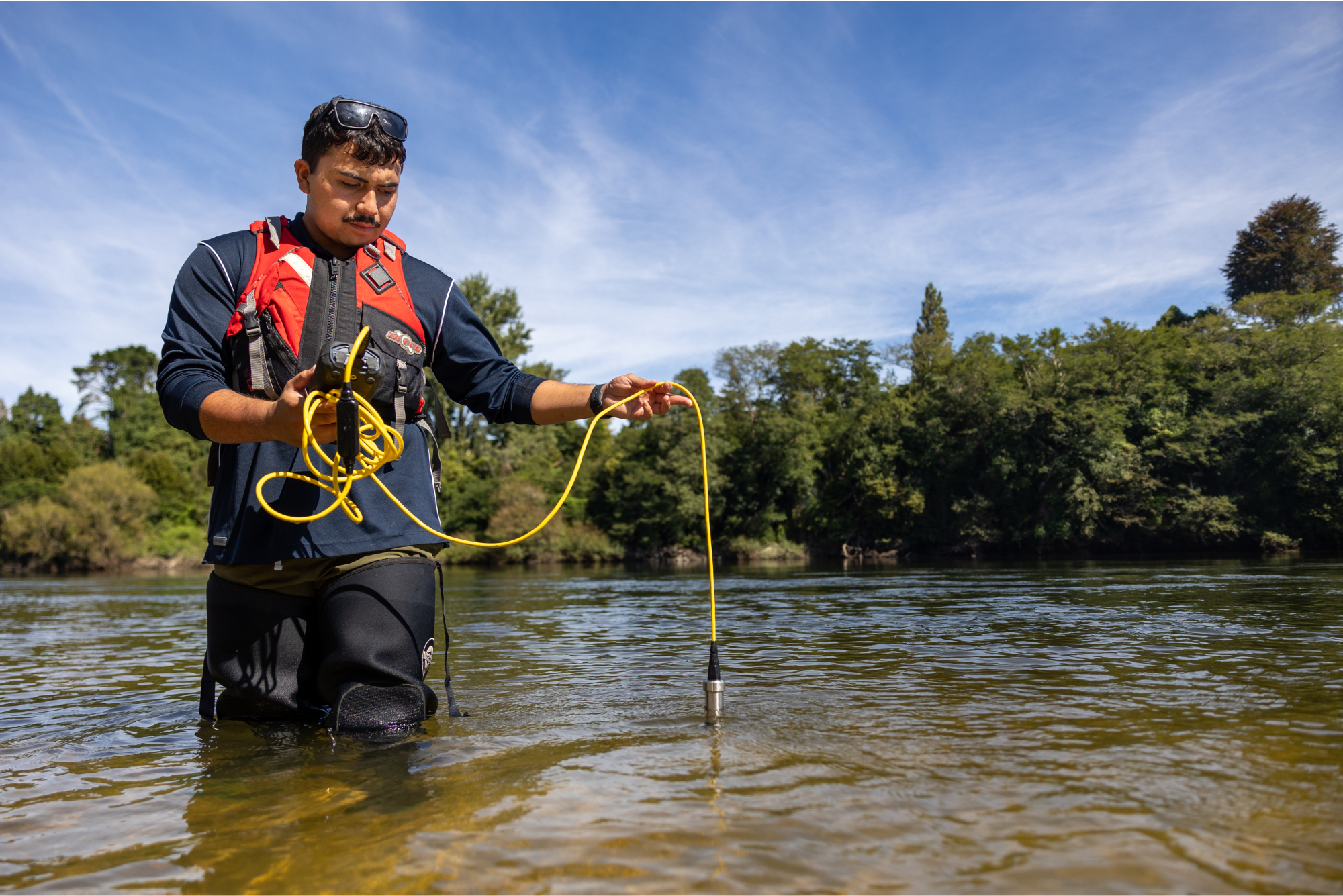 student-conducting-water-science-research