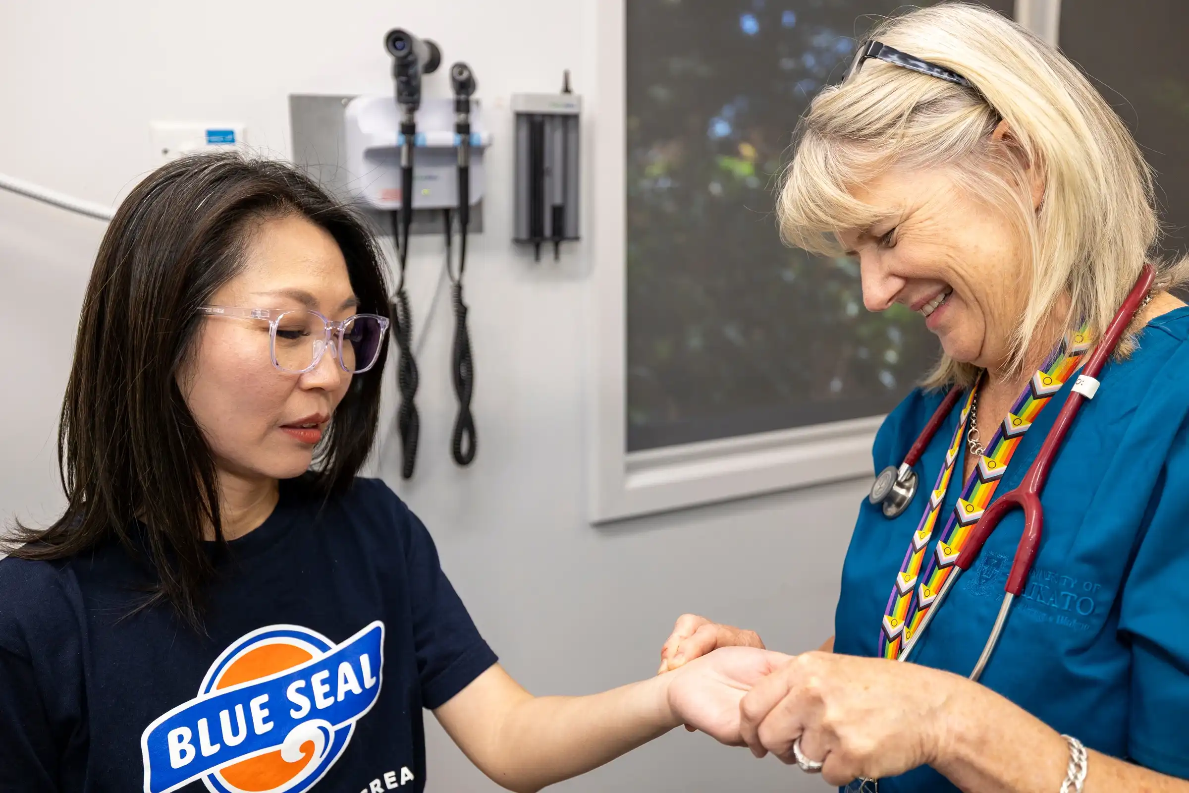 staff nurse caring for student