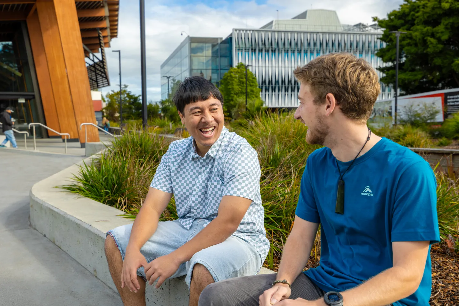 two-students-laughing-outside-pa