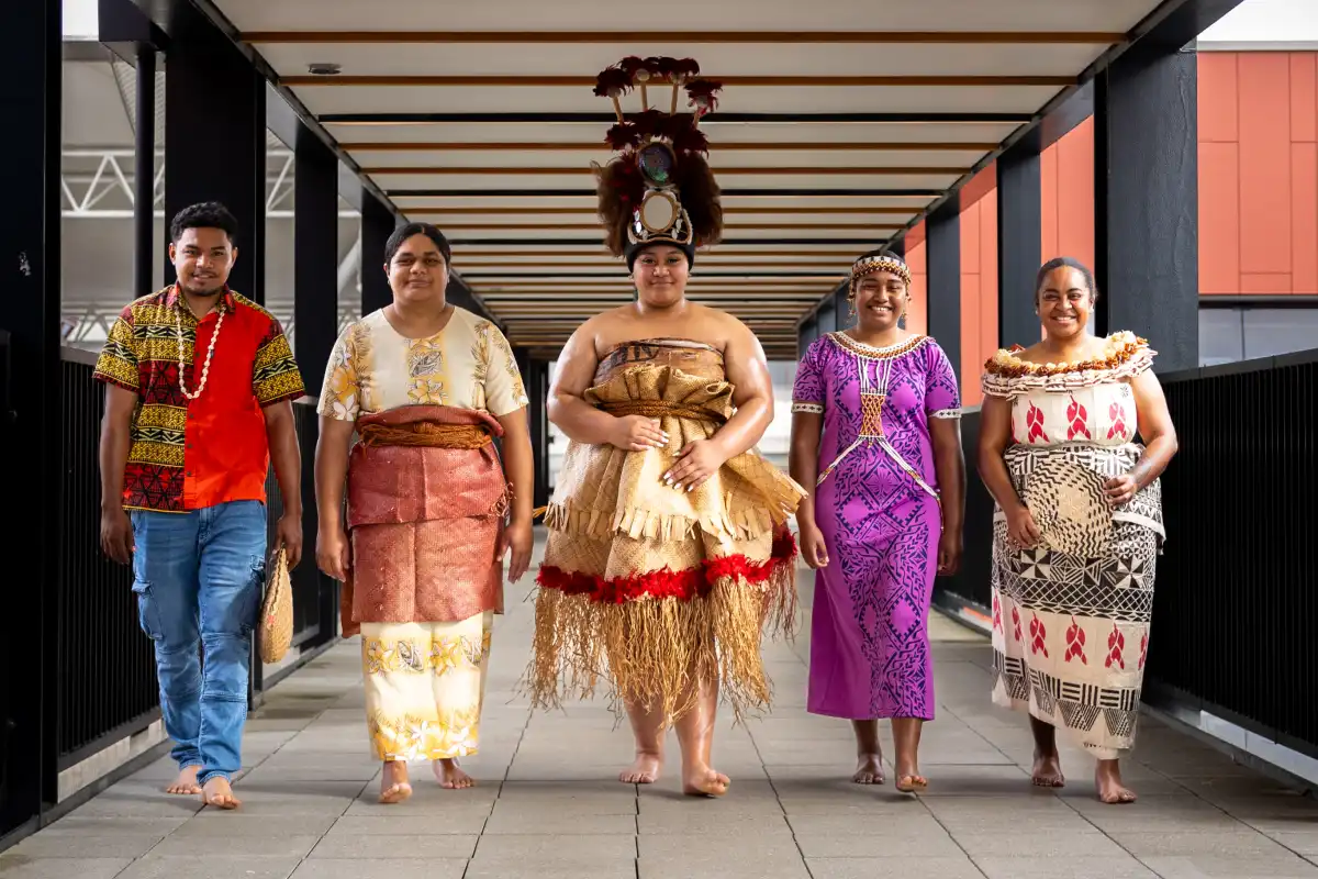 pacific students walking across pabridge