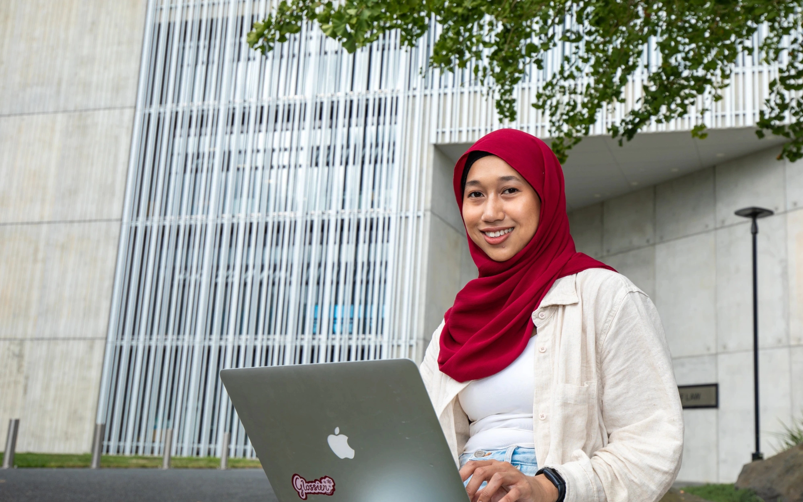 Malaysia student in front of Law building