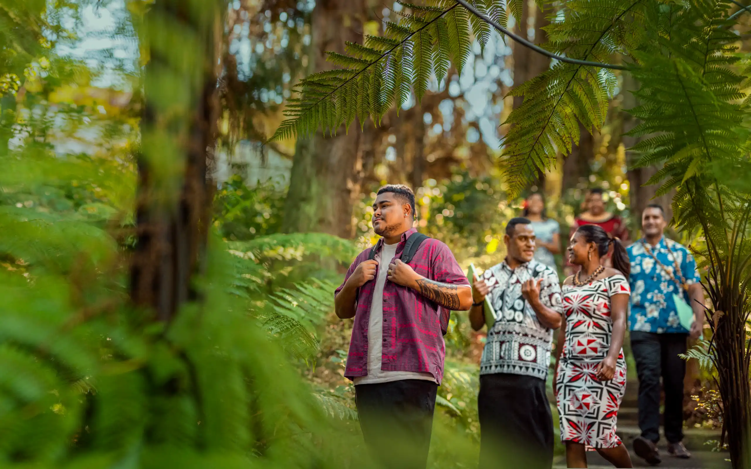 pacific students walking through bush compressed